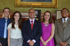 Mayor Jorge Elorza with Sierra Barter, Travis Escobar, Grace Evans, Tyrene Jones, and Drew Milligan.