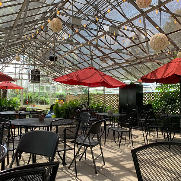 Seats and Tables set up in the Greenhouse