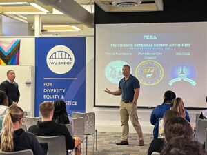 Photo of a PERA representative giving a training to JWU