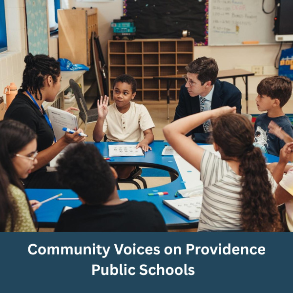 Community Voices on Providence Public Schools - Photo shows the Mayor Brett Smiley Interacting with children at school.