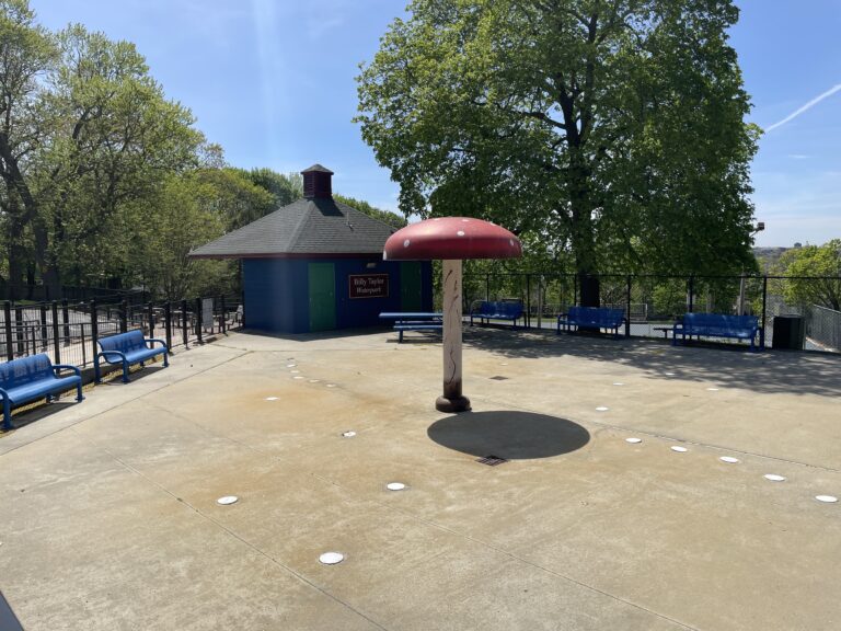 photo showing splash pad area and seating areas