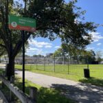 photo of a sign for amos earley park and soccer fields