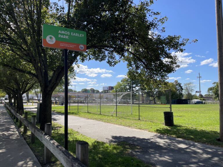 photo of a sign for amos earley park and soccer fields