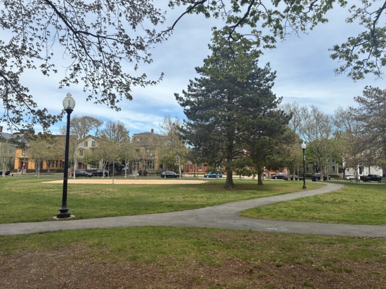 photo showing walking paths and trees and grassy areas of a providence park