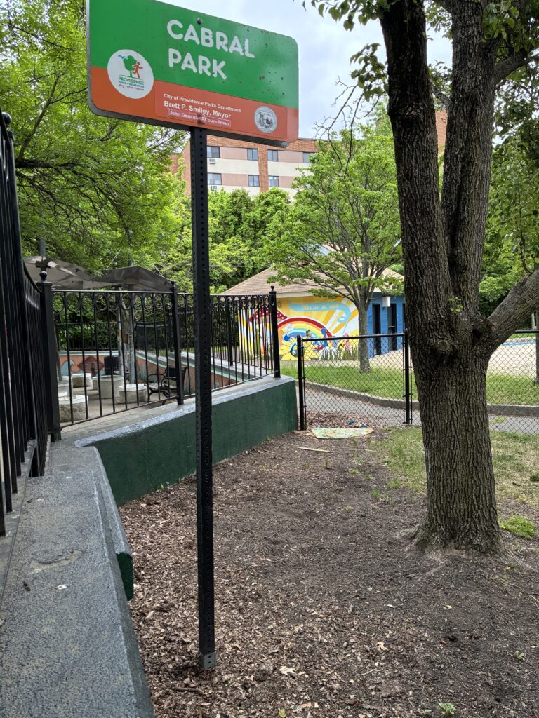 A photo showing a tree and a sign for Cabral Park