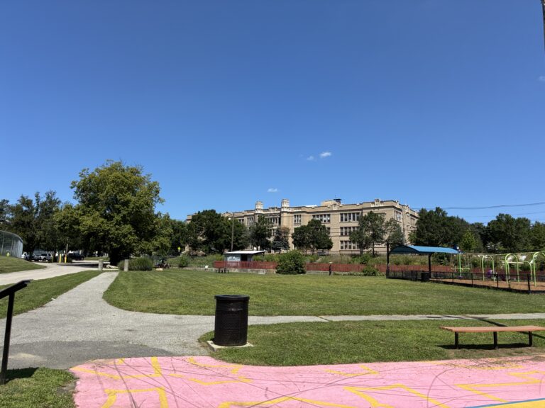 photo of a grass field and walking paths in a providence park