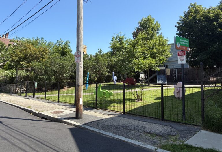 photo showing a fence around the playground