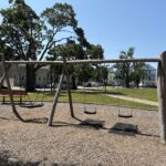 photo of a wooden swing set