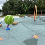 photo showing splashpad features in a park