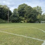 photo showing a sports field and net