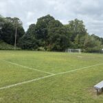photo showing a sports field and net