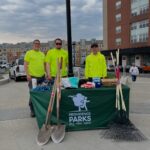Parks crew downtown leading volunteers at Train Station Meadow