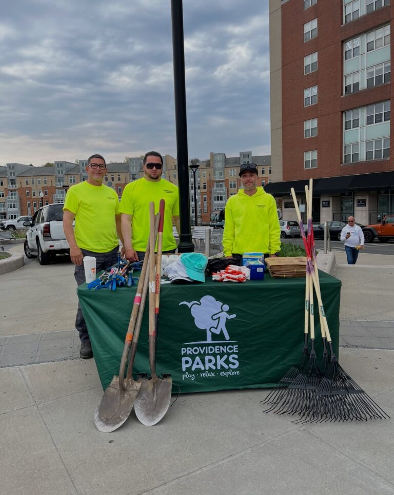 Parks crew downtown leading volunteers at Train Station Meadow