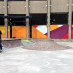 A person using a skateboard at the skate park at Adrian Hall Way