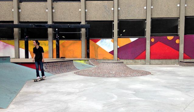 A person using a skateboard at the skate park at Adrian Hall Way