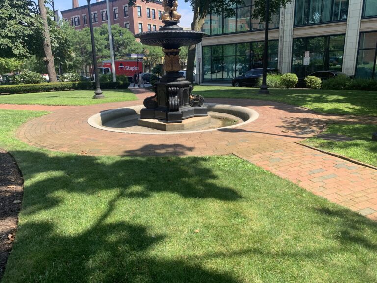 photo of a fountain and walking paths