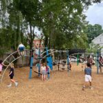 Photo showing children playing on playground structures at Brassil Park
