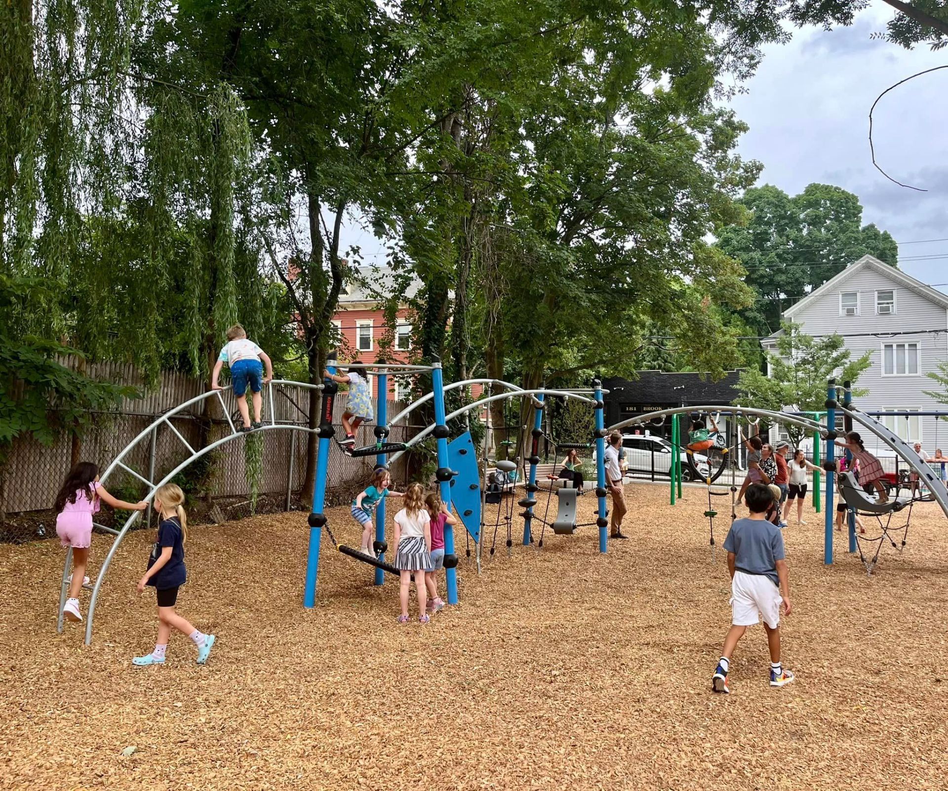 Photo showing children playing on playground structures at Brassil Park