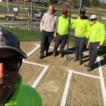 Parks ballfield crew selfie from behind the plate at JT Owens Park softball field