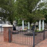 photo showing a small urban park and gazebo