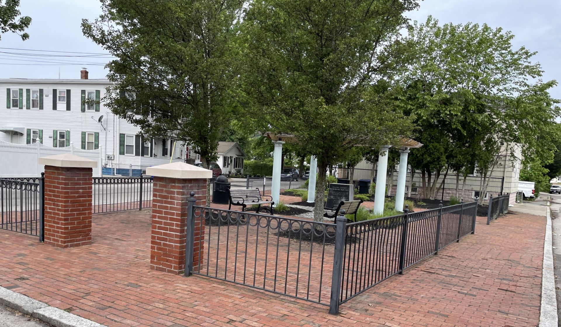 Photo showing fenced in seating areas of Cerbo Square