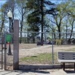 Photo showing seating and the dog park at Franciscan Park