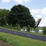 Photo showing the bikepath through Gano Park with the Crook Point Bascule Bridge in the background