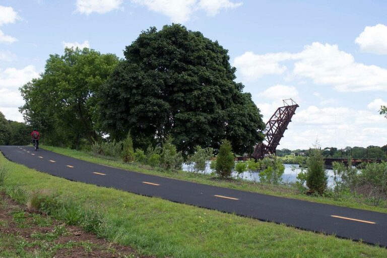 Photo showing the bikepath through Gano Park with the Crook Point Bascule Bridge in the background