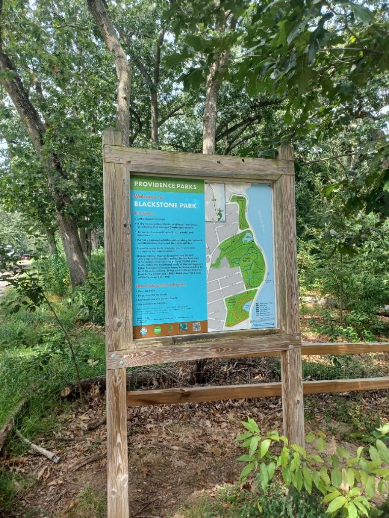 photo of a kiosk displaying trail maps