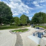 Photo showing walking paths and seating/picnic areas at Jacqueline M. Clements Park