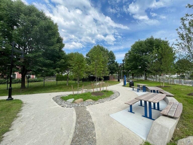 Photo showing walking paths and seating/picnic areas at Jacqueline M. Clements Park