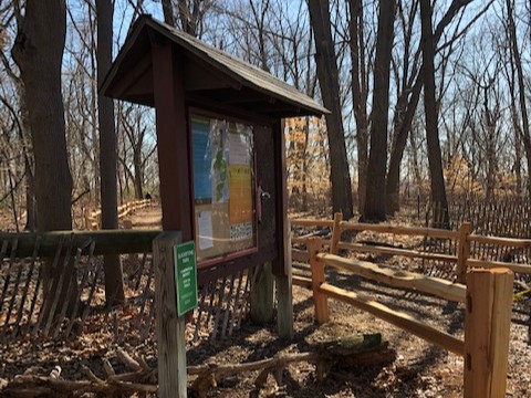 photo f a kiosk displaying trail maps