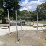 Photo showing water misters and playground structures at Lippitt Park