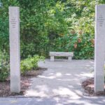 Mary E Sharpe Park handscaped entrance with granite bench