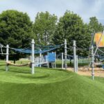Photo showing playground structures at Neutaconkanut Hill and Park