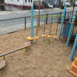 Pearl St Park play structure for ages 5-12 balance features