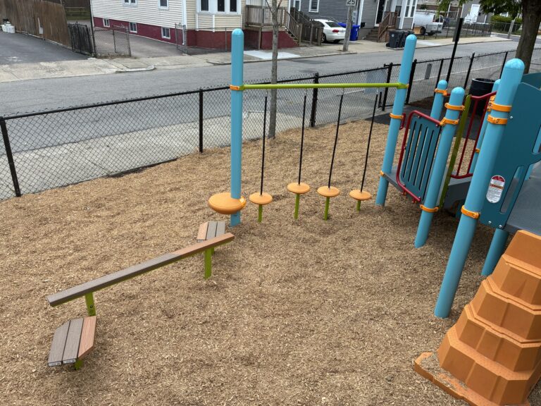 Pearl St Park play structure for ages 5-12 balance features
