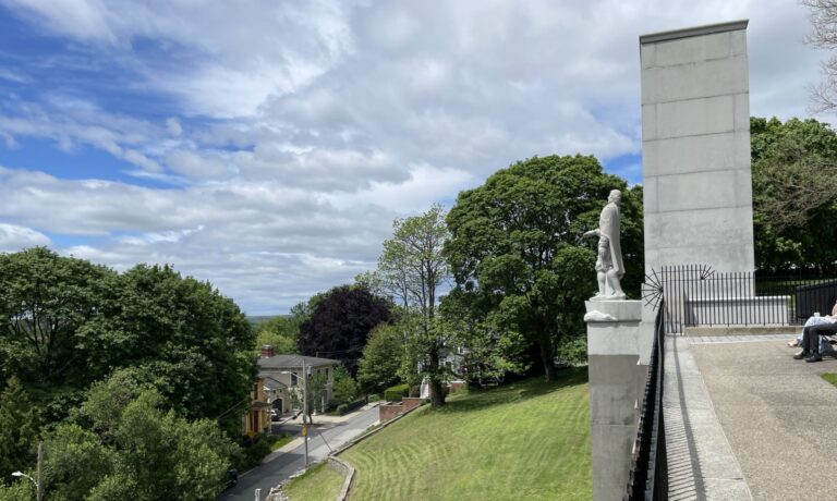 Photo showing trees and statue of Roger Williams at Prospect Terrace