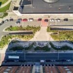 birds eye view photo showing walking paths and streets surrounding a park