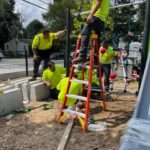 Parks crew installing Playground equipment at Viscolosi Park