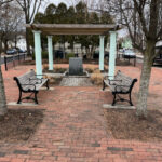 photo showing a small urban park and gazebo