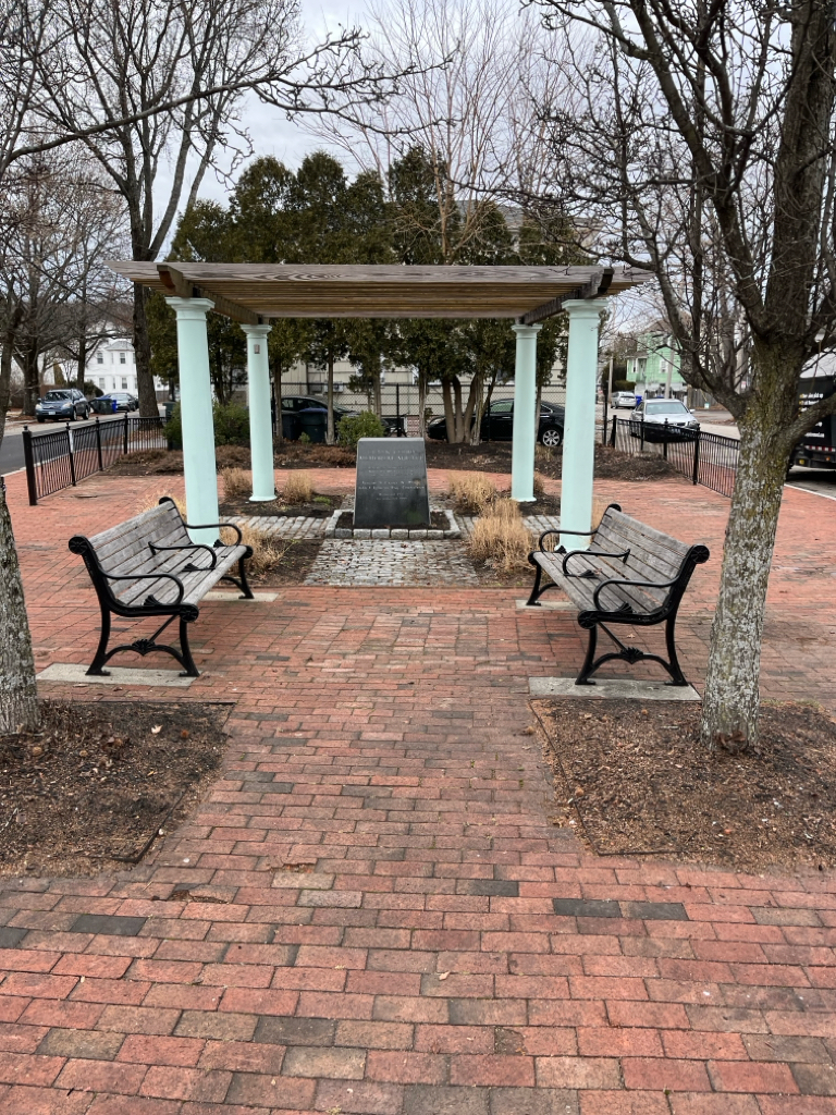 photo showing a small urban park and gazebo