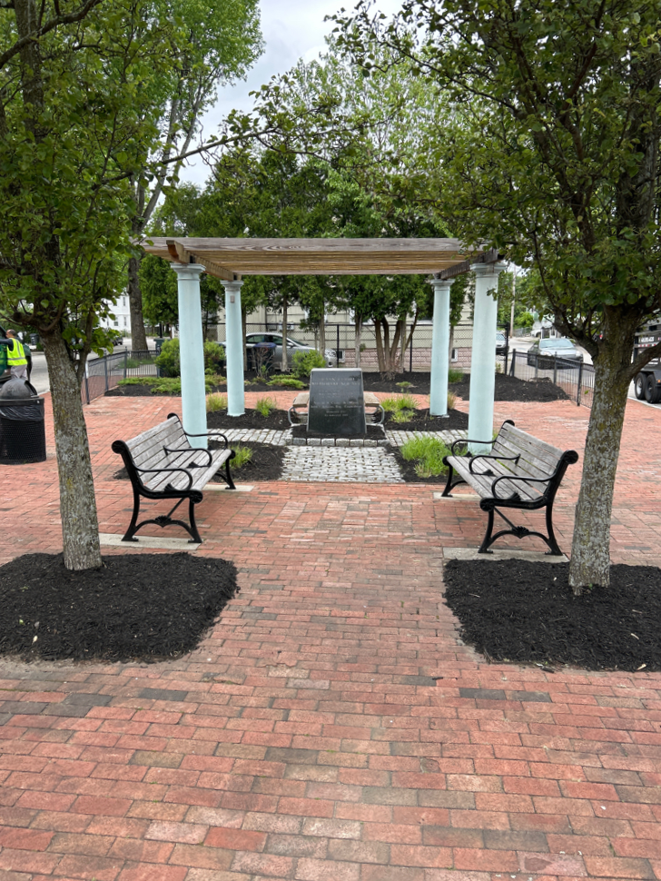 photo showing a small urban park and gazebo
