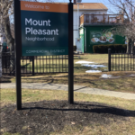 photo showing sign that reads "welcome to mount pleasant neighborhood"