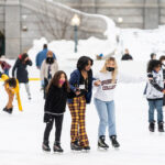 People Ice Skating at the Providence Rink