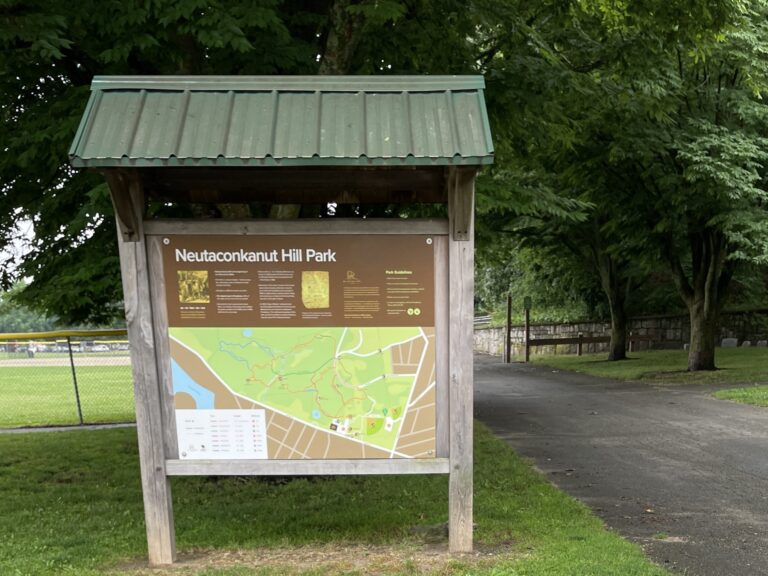 Neutaconkanut Hill trail map kiosk on Killingly St side parking lot