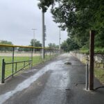 Neutaconkanut paved walking path looking south from Killingly St past softball field