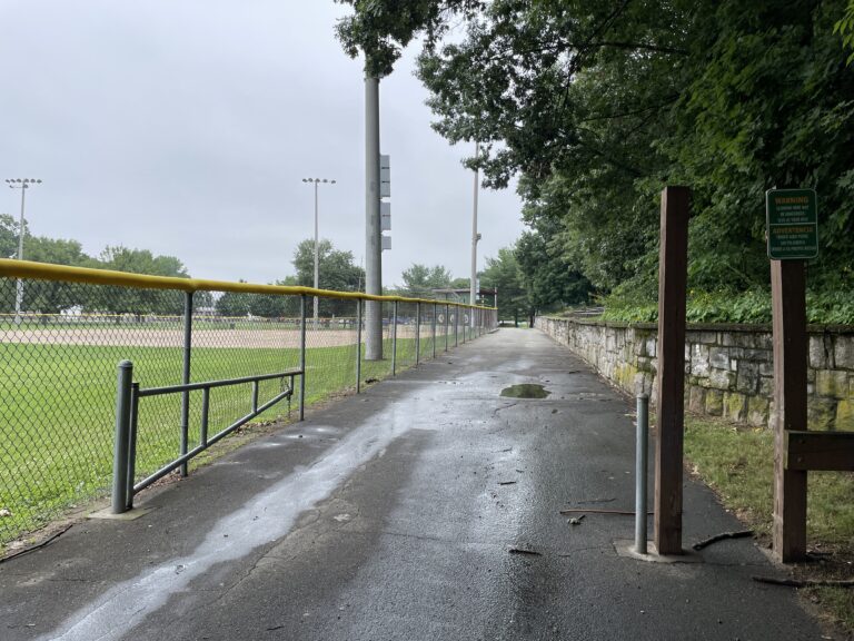 Neutaconkanut paved walking path looking south from Killingly St past softball field