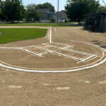 Neutaconkanut Little League field first base line July 2026