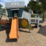 Father Lennon Park playground playhouse with slide for ages 2-5